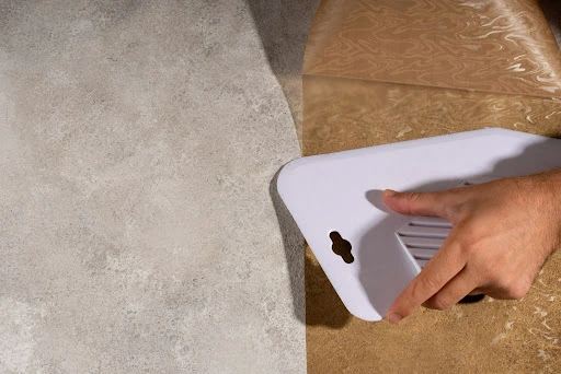 A man Replacing Subfloor from Water Damage